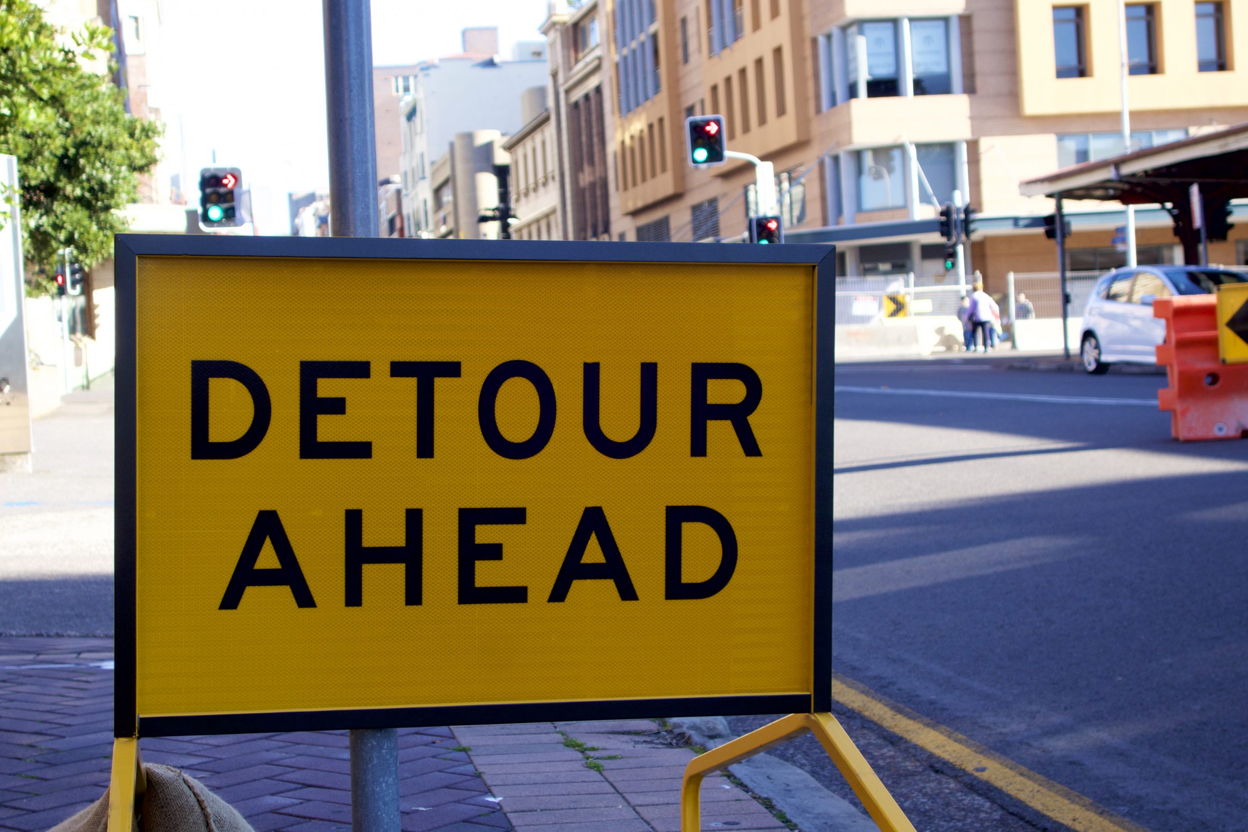 Black and Yellow Detour Ahead On Standing Metal Sign Frame